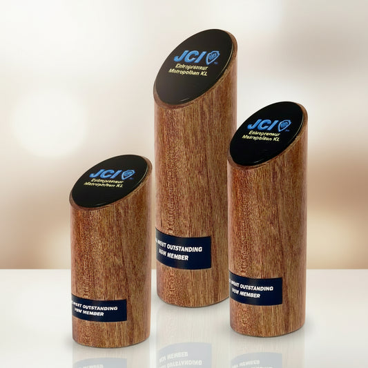 Three wooden awards with black tops and text. Customised trophy in Singapore